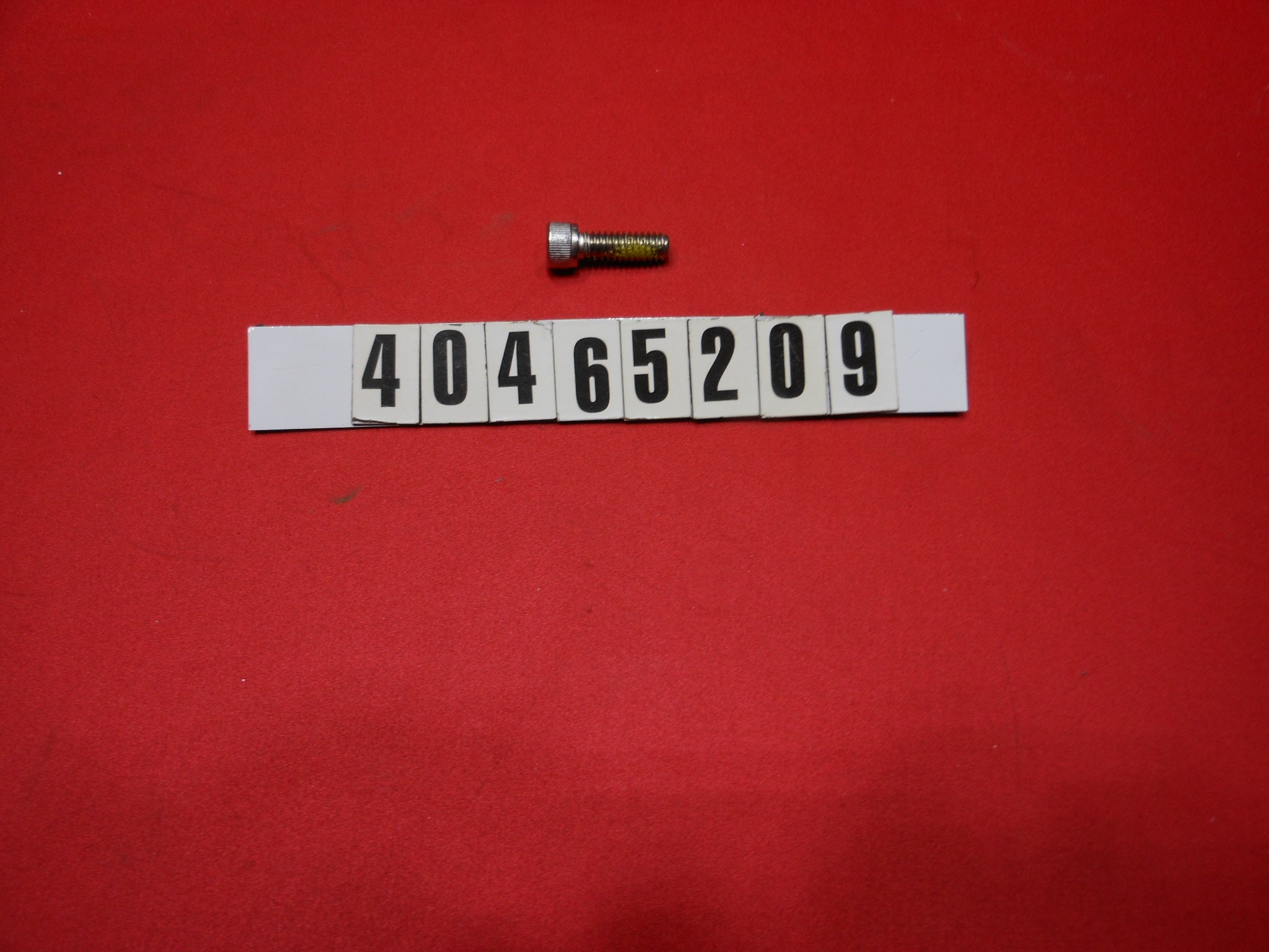 Replaced by Part# 58205912 : TOWER-SPEAKER HOUSING & LIGHT POD SOCKET CAP SCREW '07-08 NLA