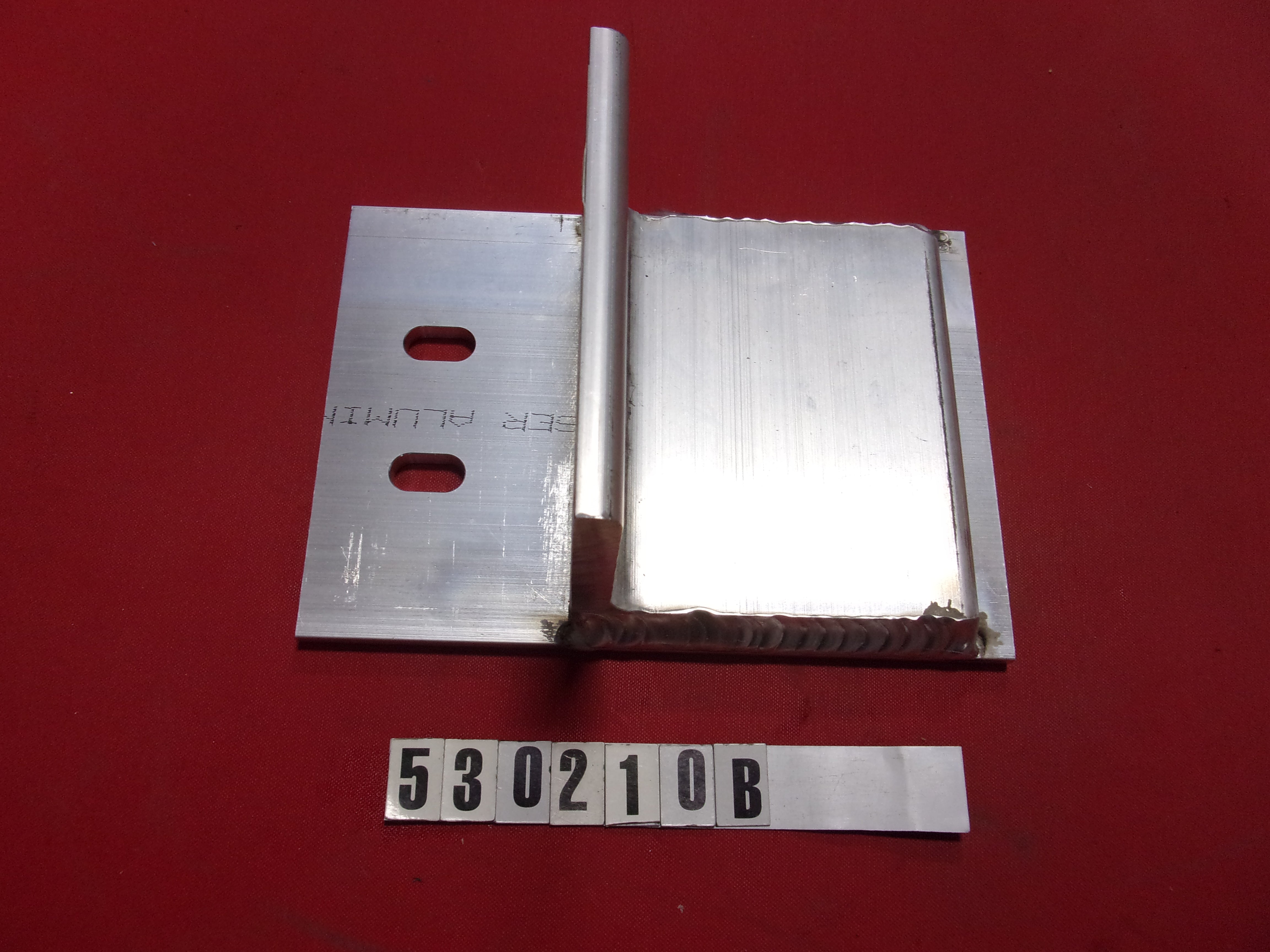 BRACKET-LWR PYLON REMOVE NUT CATCHER PROSTAR REV B'15